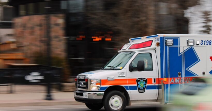 Ambulance in motion representing the effect of prehospital time on trauma outcomes