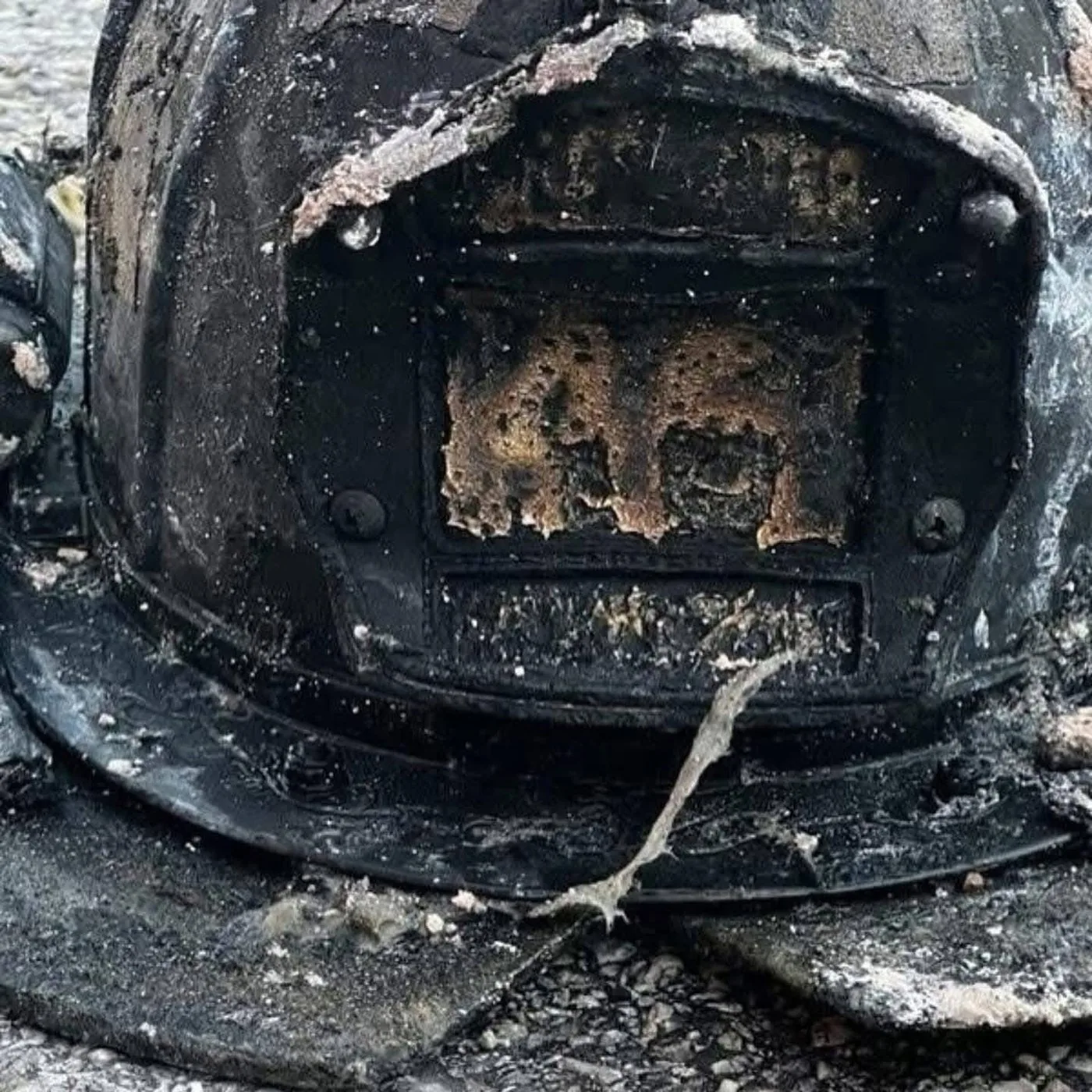 Firefighter helmet showing thermal degradation after the Houston apartment flashover