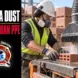 Worker using respiratory protection and dust controls during brick processing, with the headline Silica Dust: More Than PPE.