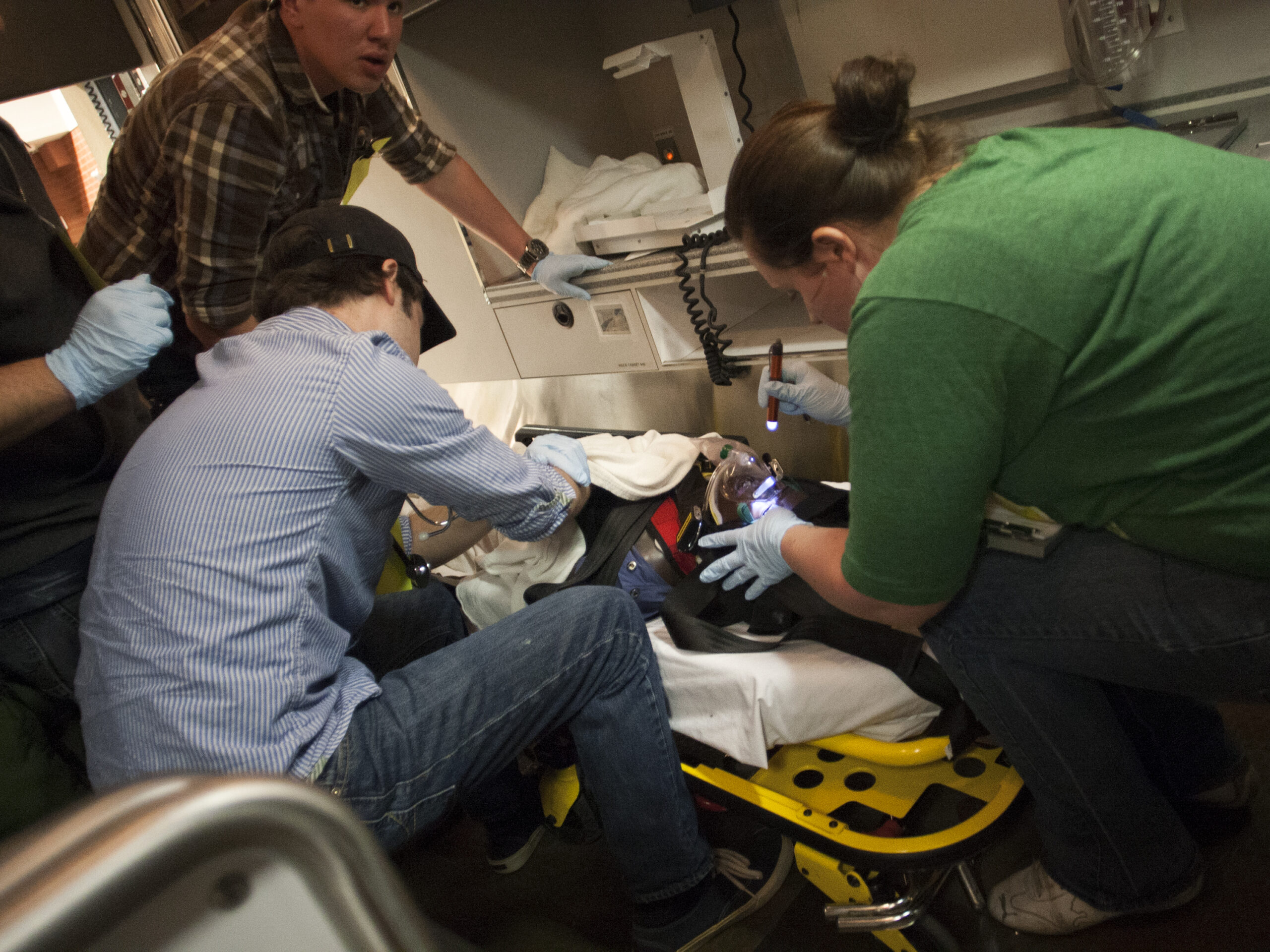 EMT and nursing students participate in a pediatric emergency simulation at College of DuPage.